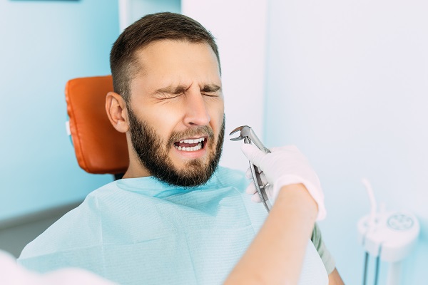 A,Man,Treats,His,Teeth,At,The,Dentist.,Dental,Examination